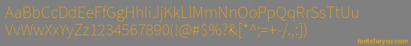 SourcesansproExtralight Font – Orange Fonts on Gray Background