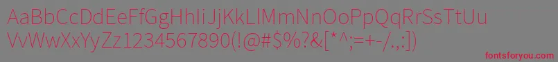 SourcesansproExtralight Font – Red Fonts on Gray Background