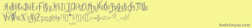 LutinPaniquangoisse-Schriftart – Graue Schriften auf gelbem Hintergrund