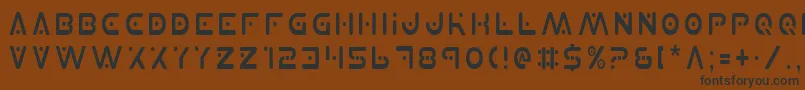 フォントPlanetXCondensed – 黒い文字が茶色の背景にあります