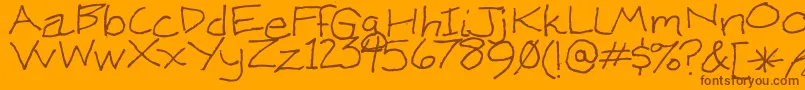 KenWeigand Font – Brown Fonts on Orange Background