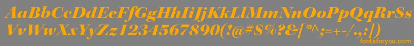 フォントKeplerstdBlackextitdisp – オレンジの文字は灰色の背景にあります。