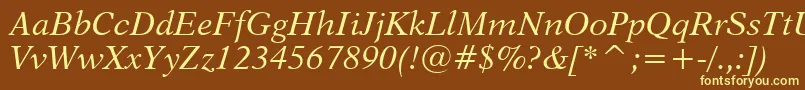 Dutch823ItalicBt-fontti – keltaiset fontit ruskealla taustalla