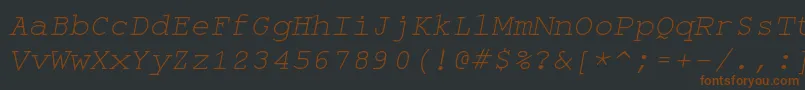 Fonte Monospaceoblique – fontes marrons em um fundo preto