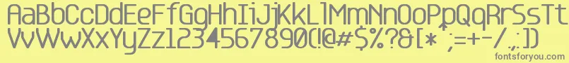 フォントBase 5 – 黄色の背景に灰色の文字