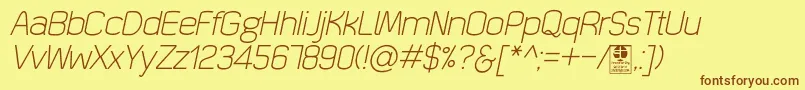 Шрифт QuizmaLightItalicDemo – коричневые шрифты на жёлтом фоне