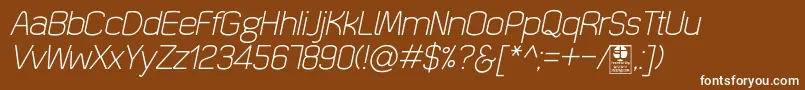 QuizmaLightItalicDemo-fontti – valkoiset fontit ruskealla taustalla