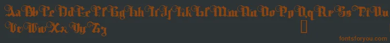 TyrfingDemo-Schriftart – Braune Schriften auf schwarzem Hintergrund