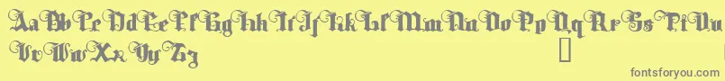 TyrfingDemo-fontti – harmaat kirjasimet keltaisella taustalla