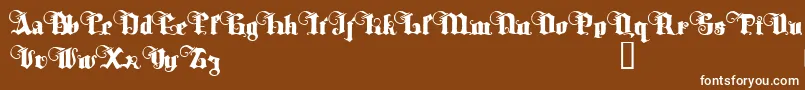 TyrfingDemo-fontti – valkoiset fontit ruskealla taustalla