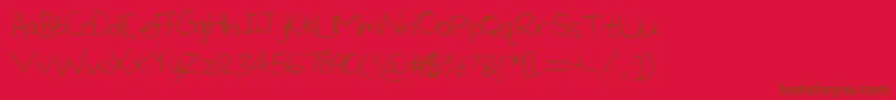 LargeHandwriting Font – Brown Fonts on Red Background