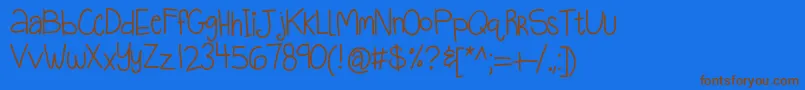 Kbquietstories Font – Brown Fonts on Blue Background