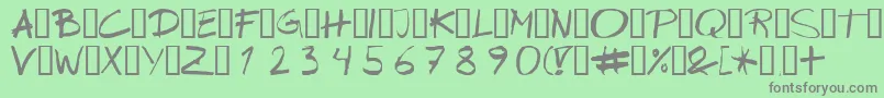 Wipeout-fontti – harmaat kirjasimet vihreällä taustalla
