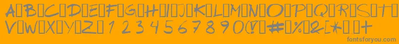 Wipeout-fontti – harmaat kirjasimet oranssilla taustalla