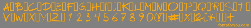 フォントWipeout – オレンジの文字は灰色の背景にあります。