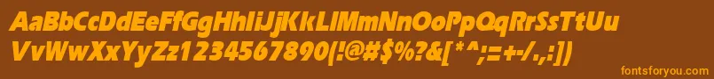 フォントErgoeblackcondItalic – オレンジ色の文字が茶色の背景にあります。
