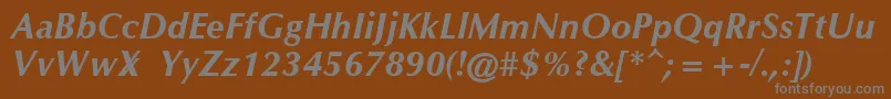 OmichronBoldItalic-fontti – harmaat kirjasimet ruskealla taustalla
