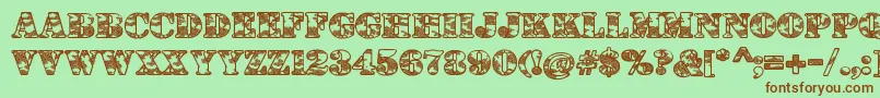 DolenTaith Font – Brown Fonts on Green Background