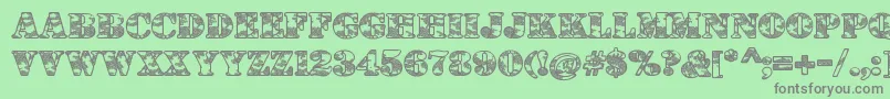 DolenTaith Font – Gray Fonts on Green Background