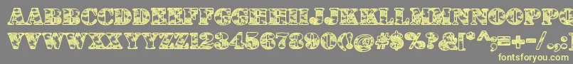 DolenTaith Font – Yellow Fonts on Gray Background