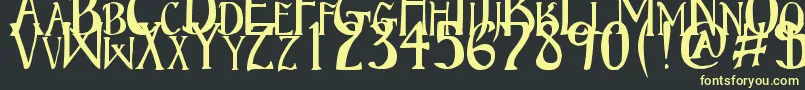 フォントBruceStandardText – 黒い背景に黄色の文字