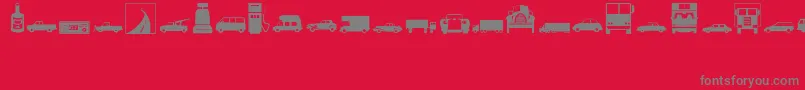 Transportation-fontti – harmaat kirjasimet punaisella taustalla