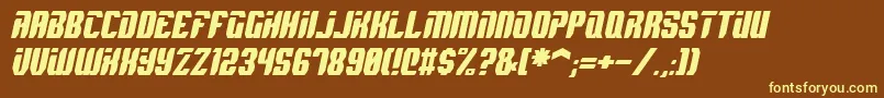 SpyhItalic-fontti – keltaiset fontit ruskealla taustalla