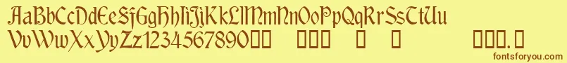 RousseauTM Font – Brown Fonts on Yellow Background