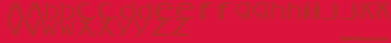 AezVanity-fontti – ruskeat fontit punaisella taustalla