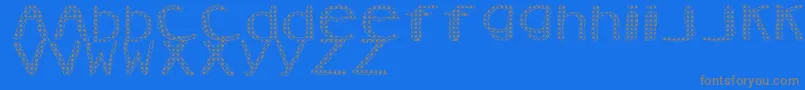 Fonte AezVanity – fontes cinzas em um fundo azul