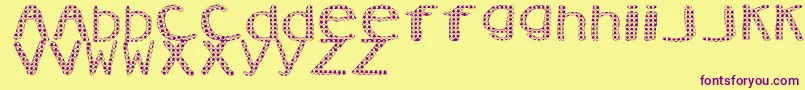 AezVanity-Schriftart – Violette Schriften auf gelbem Hintergrund