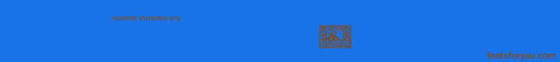 JfCotswoldAccents-Schriftart – Braune Schriften auf blauem Hintergrund