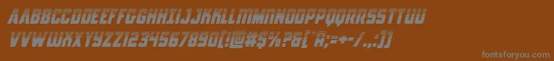 Antilleshalfital-fontti – harmaat kirjasimet ruskealla taustalla
