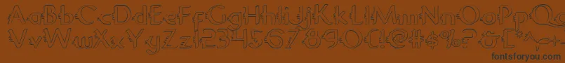 Więcej informacji o czcionce Gypsyroado Czcionka Gypsyroado – czarne czcionki na brązowym tle