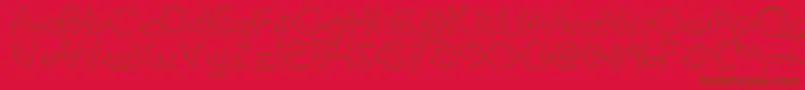 Gypsyroado Font – Brown Fonts on Red Background