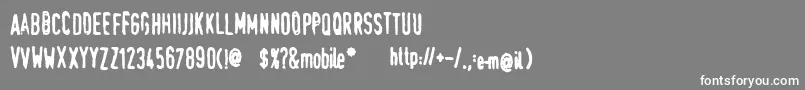 フォントTraumaSw – 灰色の背景に白い文字