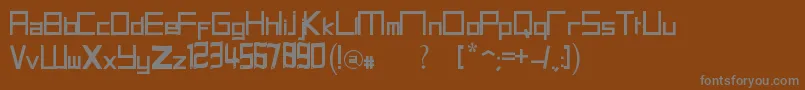 HalitSFont21-Schriftart – Graue Schriften auf braunem Hintergrund