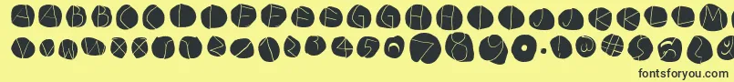 DiskoLightinvers Font – Black Fonts on Yellow Background