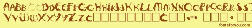 Pussyfoota Font – Brown Fonts on Yellow Background