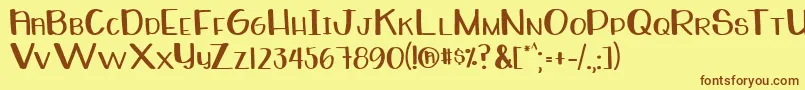 フォントWhiteboardRegular – 茶色の文字が黄色の背景にあります。