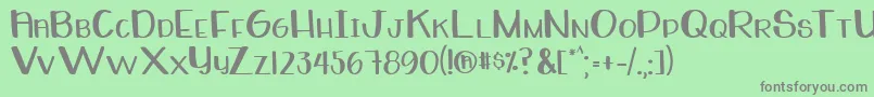 フォントWhiteboardRegular – 緑の背景に灰色の文字