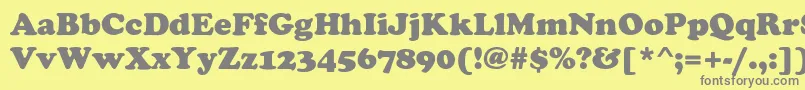 フォントChacey – 黄色の背景に灰色の文字