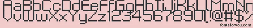 フォントKyrou9Regular – ピンクの背景に黒い文字