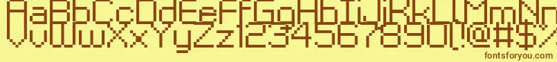 フォントKyrou9Regular – 茶色の文字が黄色の背景にあります。