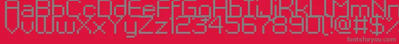 Kyrou9Regular-fontti – harmaat kirjasimet punaisella taustalla