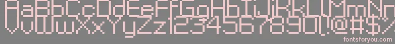 フォントKyrou9Regular – 灰色の背景にピンクのフォント