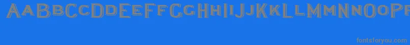 フォントLewishamshadowedwide – 青い背景に灰色の文字
