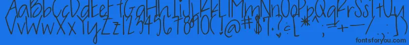 OliveCharming Font – Black Fonts on Blue Background