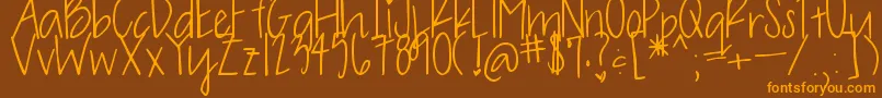 OliveCharming Font – Orange Fonts on Brown Background