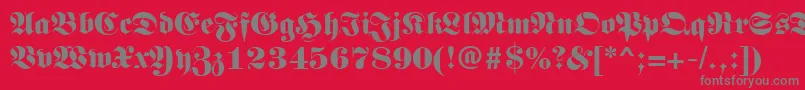 フォントLunariRegular – 赤い背景に灰色の文字
